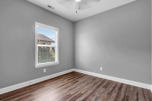 603 Browns Ferry Rd, Chattanooga, TN 37419 - unfurnished room featuring dark wood-style flooring, a ceiling fan, and baseboards