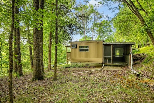 5203 Howardsville Rd, Apison, TN 37302 - rear view of property featuring a sunroom and crawl space