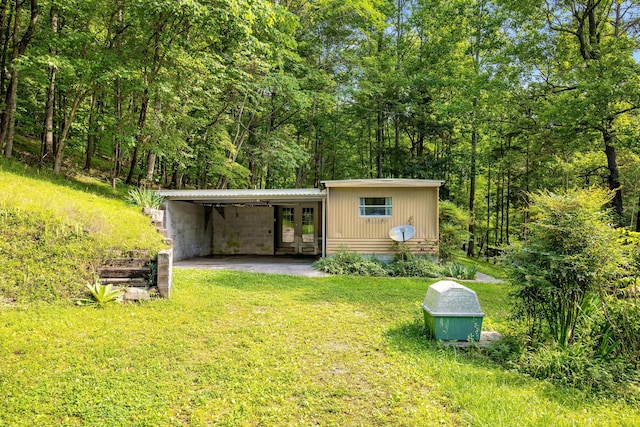 5203 Howardsville Rd, Apison, TN 37302 - view of outdoor structure featuring french doors and a carport