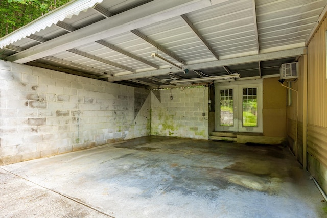 5203 Howardsville Rd, Apison, TN 37302 - garage with a wall mounted air conditioner and french doors