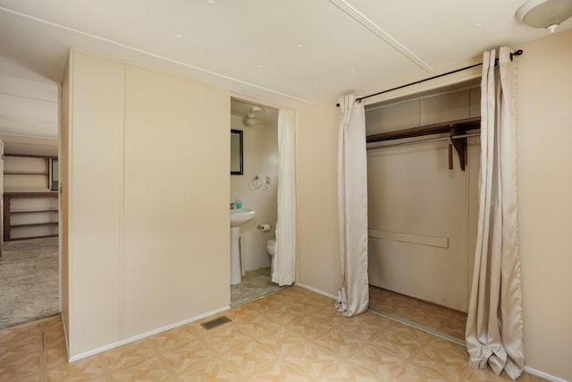 5203 Howardsville Rd, Apison, TN 37302 - unfurnished bedroom featuring a closet and connected bathroom