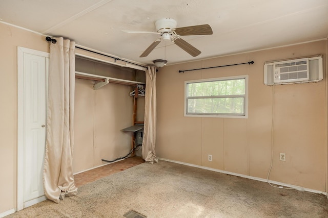 5203 Howardsville Rd, Apison, TN 37302 - unfurnished bedroom featuring a wall mounted AC, ceiling fan, and a closet