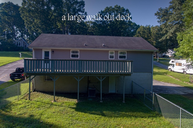 7115 Elmbrook Ln, Harrison, TN 37341 - rear view of property with a deck and a fenced backyard