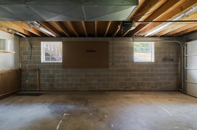 7115 Elmbrook Ln, Harrison, TN 37341 - garage featuring a garage door opener