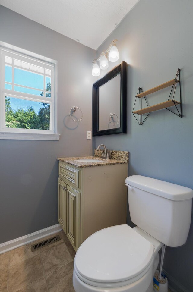 7115 Elmbrook Ln, Harrison, TN 37341 - bathroom with baseboards and vanity