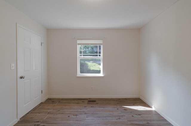 7115 Elmbrook Ln, Harrison, TN 37341 - unfurnished room featuring wood finished floors