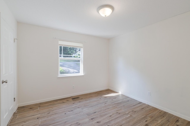 7115 Elmbrook Ln, Harrison, TN 37341 - spare room with wood finished floors and baseboards