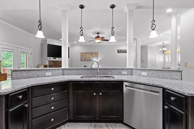 2904 Reflection Ln, Ooltewah, TN 37363 - kitchen with stainless steel dishwasher, a sink, ceiling fan, light stone countertops, and crown molding