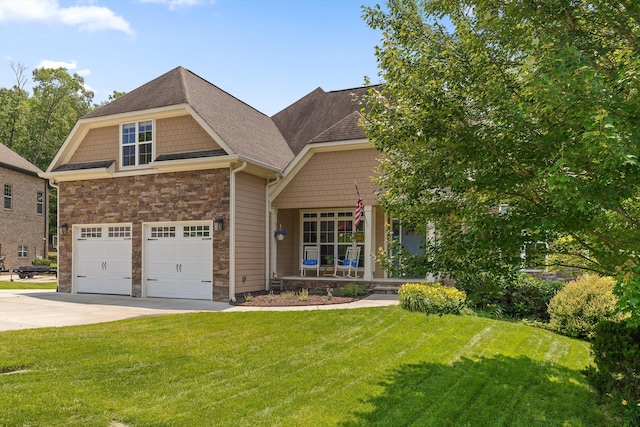 2904 Reflection Ln, Ooltewah, TN 37363 - craftsman-style home featuring a front yard, stone siding, driveway, covered porch, and a shingled roof