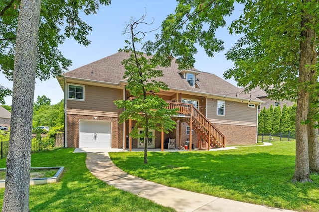 2904 Reflection Ln, Ooltewah, TN 37363 - rear view of property with brick siding, stairs, a deck, an attached garage, and a patio