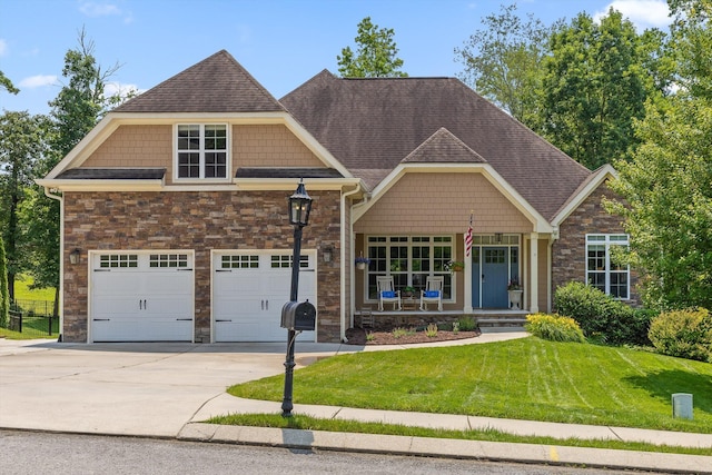 2904 Reflection Ln, Ooltewah, TN 37363 - craftsman house with a front yard, stone siding, concrete driveway, roof with shingles, and a garage