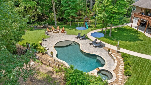 2904 Reflection Ln, Ooltewah, TN 37363 - view of swimming pool featuring an outdoor fire pit and a patio
