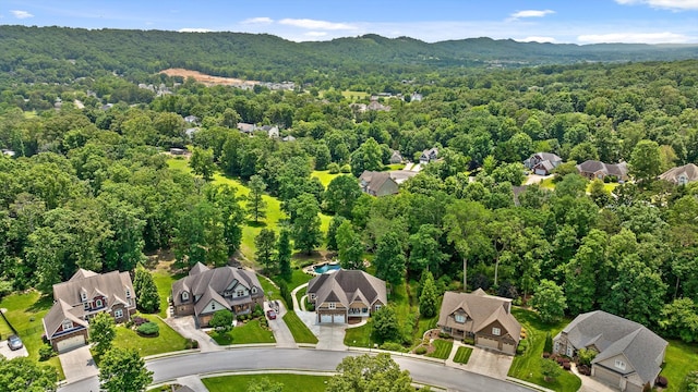 2904 Reflection Ln, Ooltewah, TN 37363 - aerial perspective of suburban area with a forest and mountains
