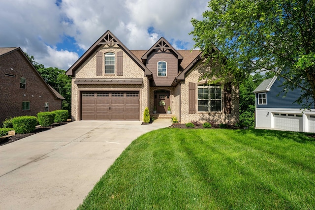 3773 Lacy Leaf Ln, Apison, TN 37302 - craftsman inspired home with concrete driveway, a front lawn, brick siding, and a garage