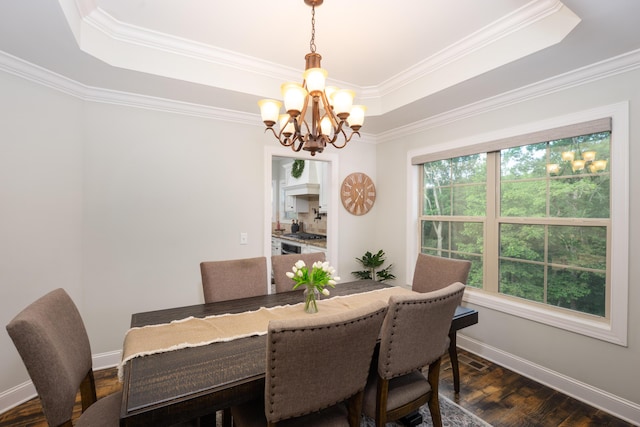 3773 Lacy Leaf Ln, Apison, TN 37302 - dining area featuring a tray ceiling, a chandelier, crown molding, baseboards, and dark wood-style flooring