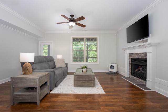 3773 Lacy Leaf Ln, Apison, TN 37302 - living room with a ceiling fan, a fireplace, crown molding, wood finished floors, and baseboards