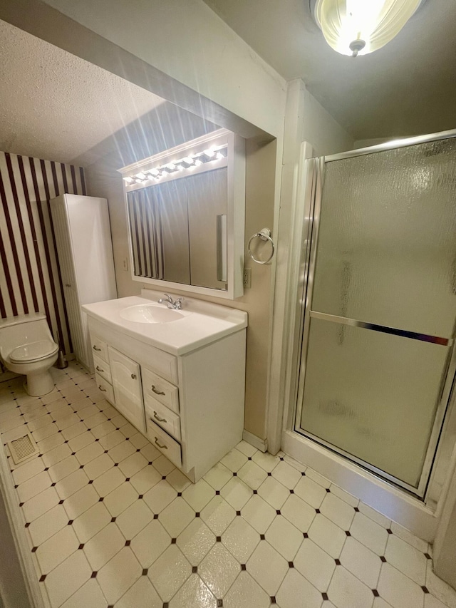 723 Godsey Ln, Chattanooga, TN 37415 - full bath featuring tile patterned floors, toilet, vanity, a shower stall, and baseboards