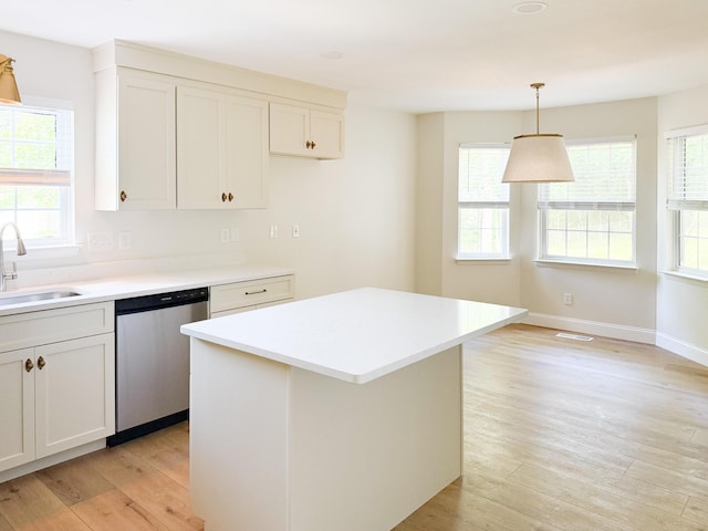 6527 Shallowmar Ln, Hixson, TN 37343 - kitchen with dishwasher, a sink, plenty of natural light, and light wood finished floors