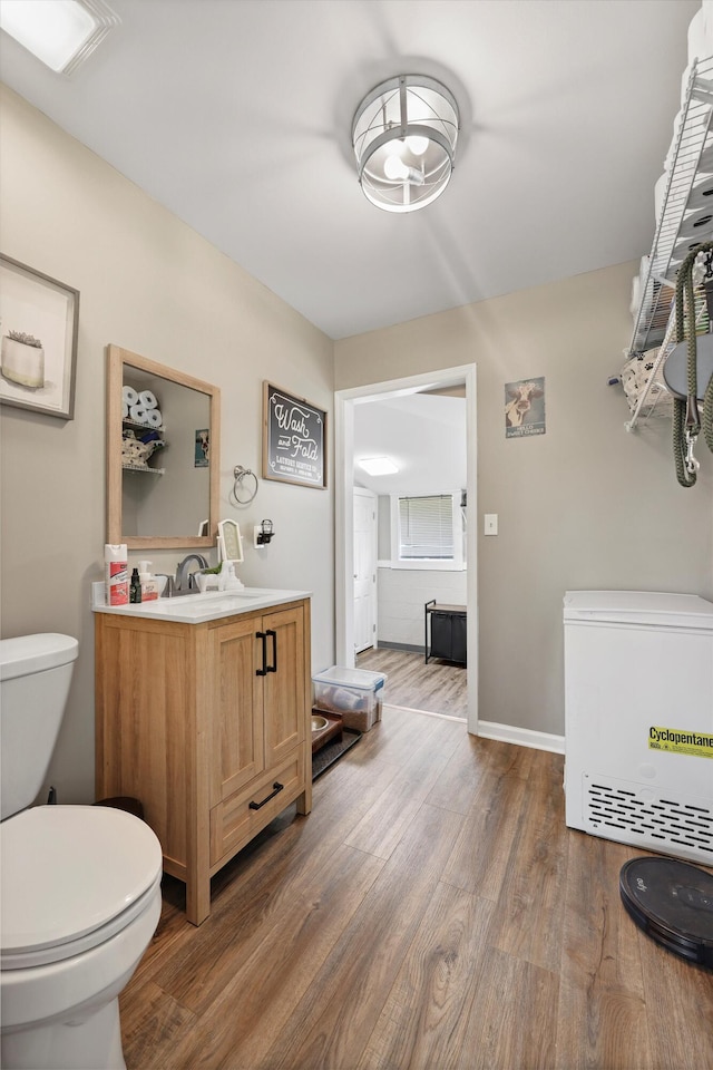 334 Kay Conley Rd, Rock Spring, GA 30739 - bathroom featuring toilet, wood finished floors, and vanity