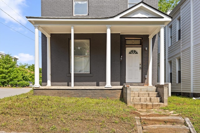 809 Fairview Ave, Chattanooga, TN 37403 - doorway to property with brick siding and a porch
