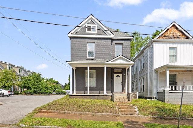 809 Fairview Ave, Chattanooga, TN 37403 - american foursquare style home featuring covered porch and brick siding