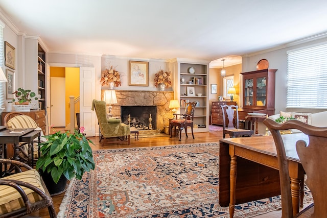 504 Fleetwood Dr, Lookout Mountain, TN 37350 - living area featuring crown molding, wood finished floors, healthy amount of natural light, and a fireplace