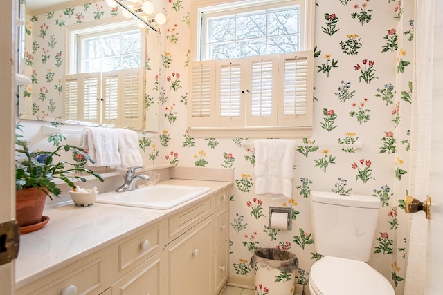 504 Fleetwood Dr, Lookout Mountain, TN 37350 - bathroom featuring wallpapered walls, vanity, and toilet