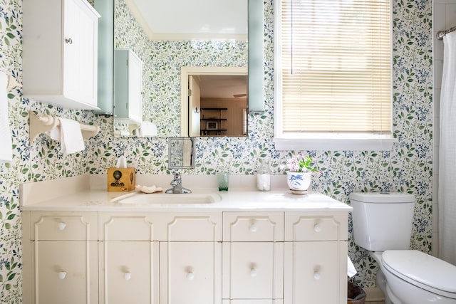 504 Fleetwood Dr, Lookout Mountain, TN 37350 - bathroom featuring vanity, toilet, and wallpapered walls