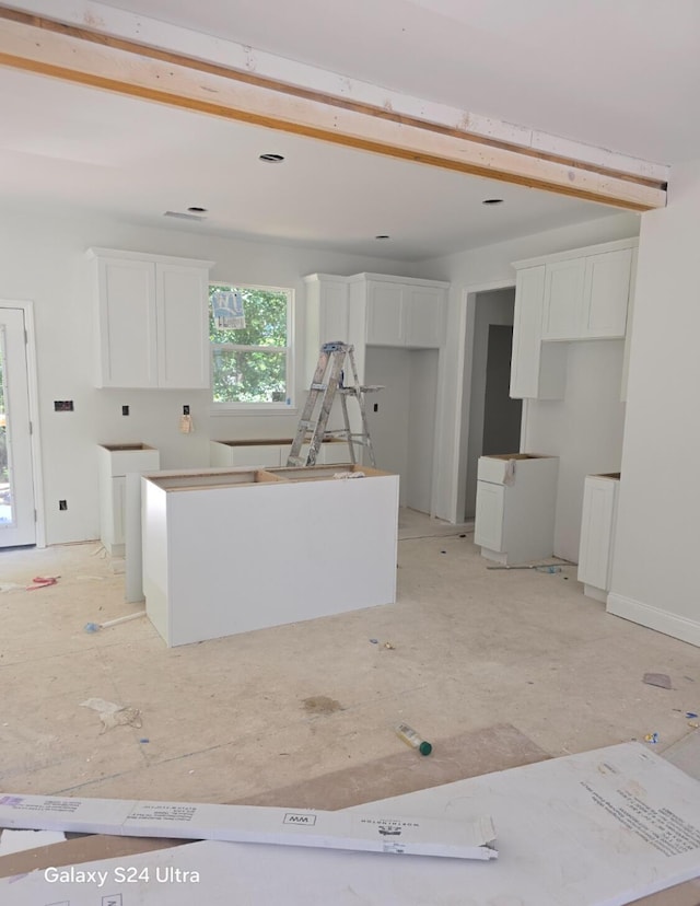 952 Lower Mill Rd, Hixson, TN 37343 - kitchen featuring a center island and white cabinetry