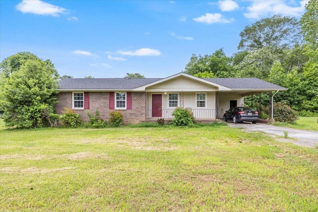 104 Johnson St, Lafayette, GA 30728 - ranch-style home featuring a porch, driveway, a carport, a front yard, and brick siding
