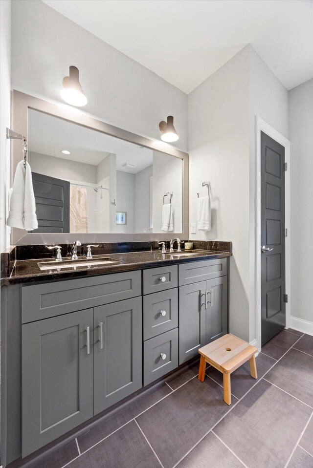 1355 Carrington Way, Chattanooga, TN 37405 - full bathroom featuring double vanity and baseboards