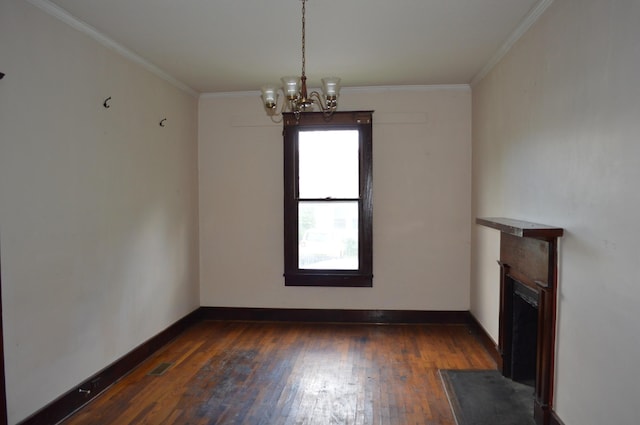 912 N Price St, Sweetwater, TN 37874 - unfurnished dining area featuring dark wood-style flooring, a chandelier, baseboards, crown molding, and a fireplace