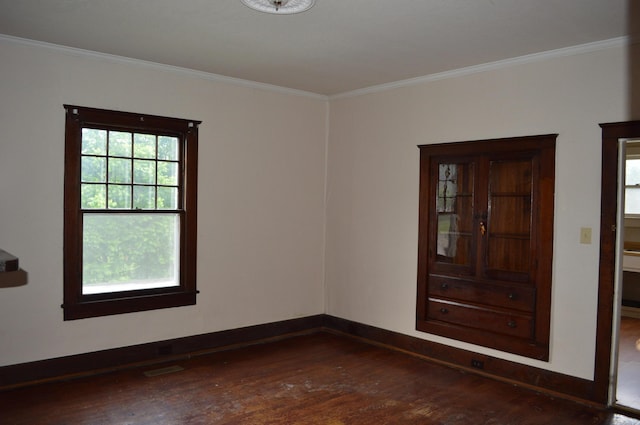 912 N Price St, Sweetwater, TN 37874 - empty room with dark wood-type flooring, ornamental molding, and healthy amount of natural light