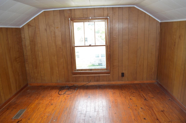 912 N Price St, Sweetwater, TN 37874 - additional living space featuring vaulted ceiling, hardwood / wood-style floors, plenty of natural light, and wood walls