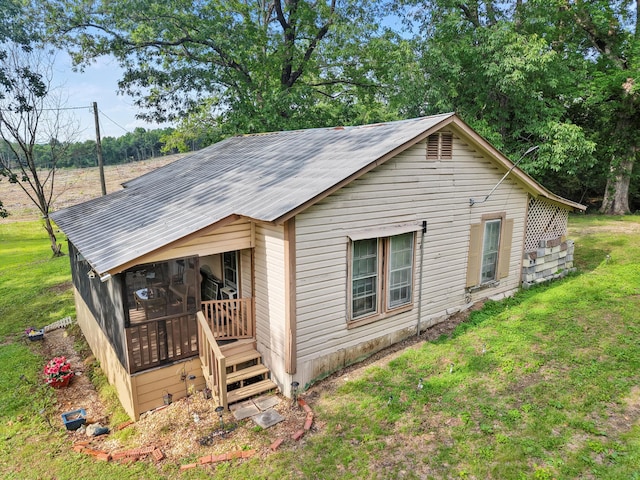 3650 Waring Rd, Dalton, GA 30721 - view of home's exterior featuring a lawn and metal roof