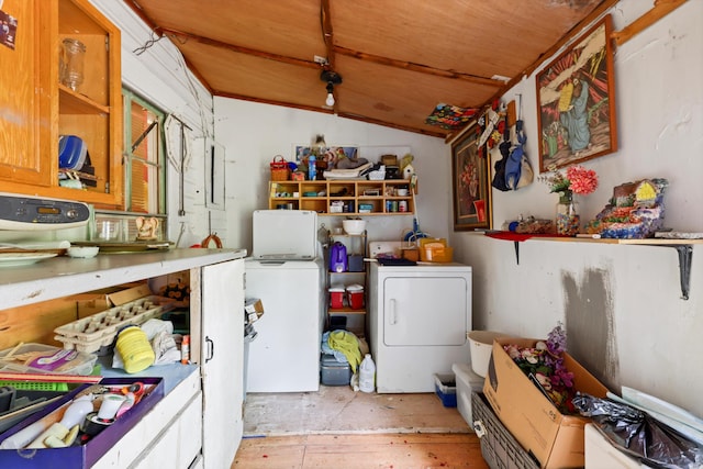 3650 Waring Rd, Dalton, GA 30721 - kitchen featuring washer / dryer, vaulted ceiling, and light wood-type flooring