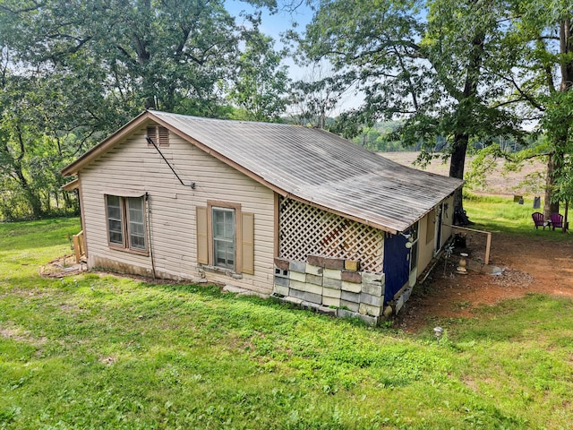 3650 Waring Rd, Dalton, GA 30721 - view of side of property featuring metal roof and a lawn