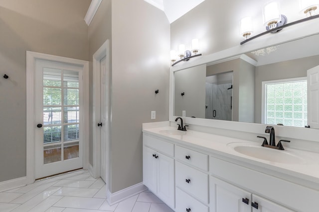 8102 Paces Ferry Xing, Chattanooga, TN 37421 - full bathroom with baseboards, double vanity, a shower stall, and tile patterned floors