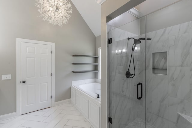 8102 Paces Ferry Xing, Chattanooga, TN 37421 - full bathroom with a garden tub, a marble finish shower, a chandelier, and baseboards