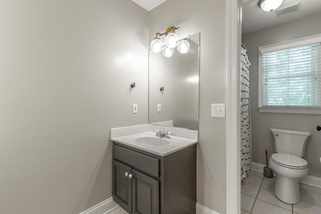 8102 Paces Ferry Xing, Chattanooga, TN 37421 - bathroom featuring vanity, toilet, tile patterned floors, baseboards, and a shower with curtain