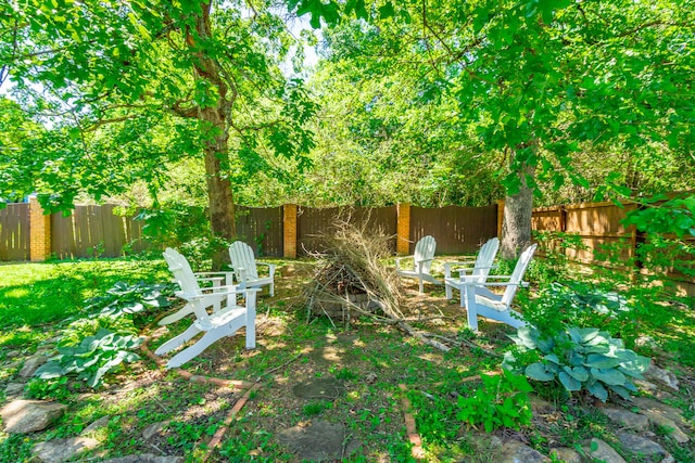 8102 Paces Ferry Xing, Chattanooga, TN 37421 - fenced backyard featuring a fire pit