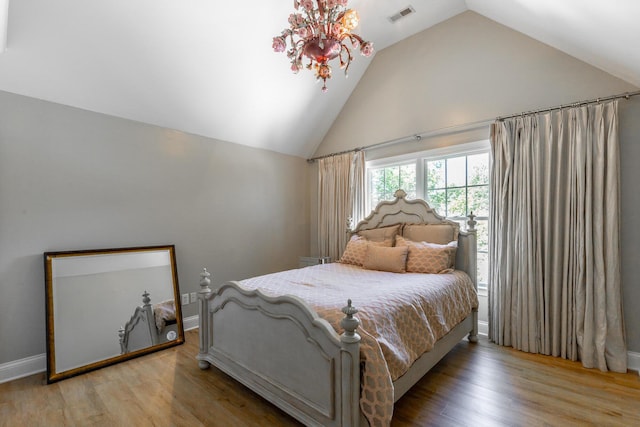 8102 Paces Ferry Xing, Chattanooga, TN 37421 - bedroom with light wood finished floors, high vaulted ceiling, and baseboards