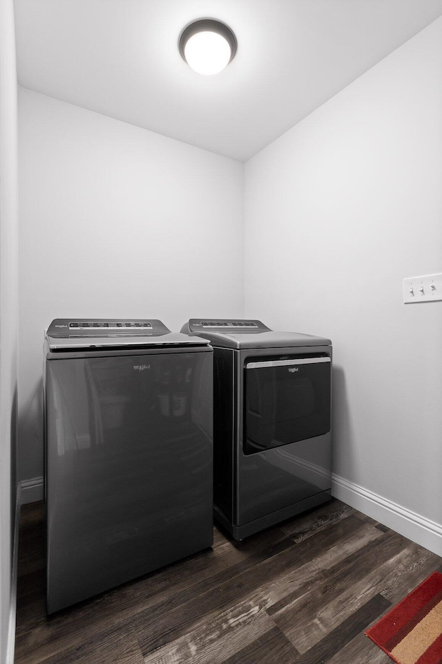 1008 Durgan Pl, Dalton, GA 30721 - washroom featuring washing machine and dryer, dark wood finished floors, and baseboards