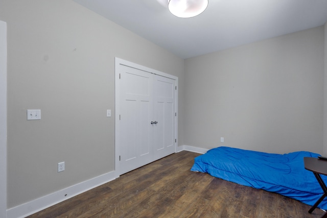 141 Woodland Way, Signal Mountain, TN 37377 - bedroom featuring wood finished floors, baseboards, and a closet