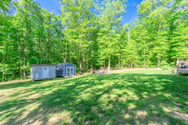 141 Woodland Way, Signal Mountain, TN 37377 - view of green lawn featuring a wooded view