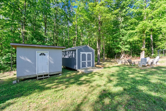 141 Woodland Way, Signal Mountain, TN 37377 - view of green lawn featuring an outdoor fire pit