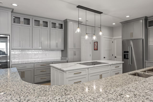 4274 Lakeshore Ln Unit 102, Chattanooga, TN 37415 - kitchen with high end fridge, black electric stovetop, gray cabinets, decorative backsplash, and recessed lighting