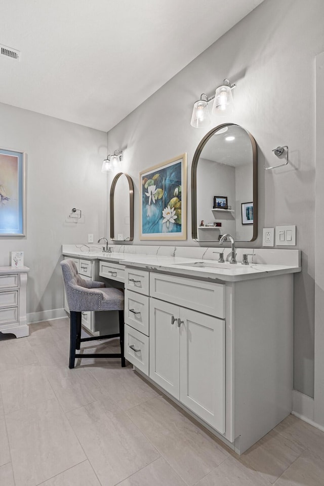 4274 Lakeshore Ln Unit 102, Chattanooga, TN 37415 - bathroom with double vanity and baseboards