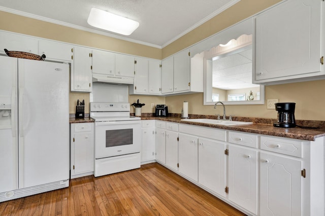 971 Hamilton Cir NW, Cleveland, TN 37312 - kitchen featuring white appliances, dark countertops, a sink, under cabinet range hood, and crown molding