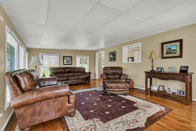 971 Hamilton Cir NW, Cleveland, TN 37312 - living area with a drop ceiling, wood finished floors, and baseboards